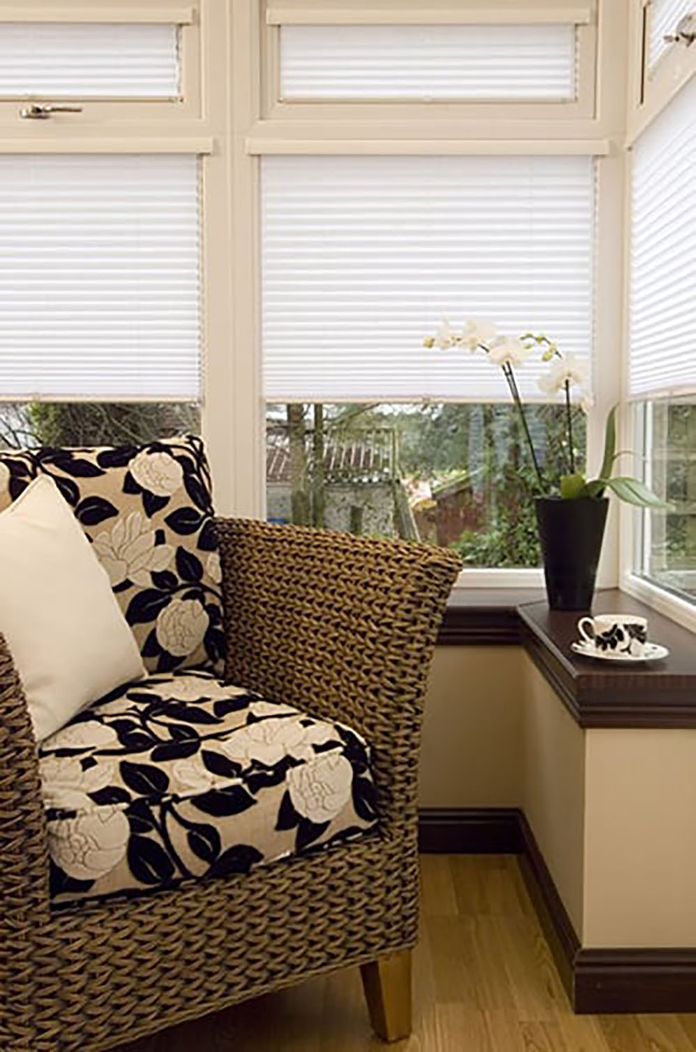 Bright room corner with blinds